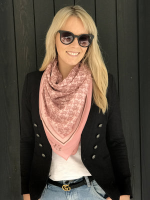 90% Modal, 10% Cashmere. Handrolled hem. Lightweight and soft feel.  This New Zealand designed scarf is pretty, feminine and fun. The pink tones add a classic warmth to every outfit.   Dimensions are 120x120cm  Our scarves are delicate and should be handled with care. They are handmade and each one is slightly unique.  Delivered in an elegant reusable gift bag.   