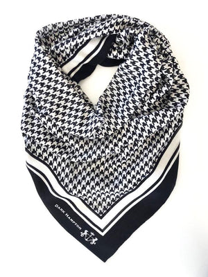 90% Modal, 10% Cashmere. Handrolled hem. Lightweight and soft feel.  This beautiful, New Zealand designed scarf is in such a striking herringbone design with our signature border and a bold combination of black & white. Strong and classic, two things we all want to be.   Dimensions are 120x120cm  Our scarves are delicate and should be handled with care. They are handmade and each one is slightly unique.  Delivered in an elegant reusable gift bag.